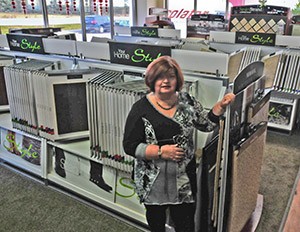 Patti-Lynn Card of Patti-Lynn Interiors, in her sales environment.