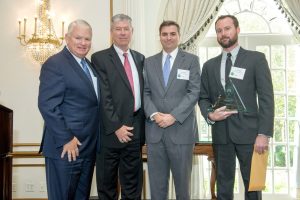 Accepting the award for Mannington are, (from left) Keith Campbell, Russell Grizzle, Zack Zehner and Ian Campbell.