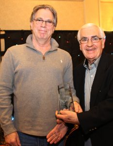 Lee Senter (left), the incoming president of the CFCRA, presenting Ted Harding, president of Kleen Kuip Supply Mart with the association’s Jim Darling lifetime achievement award.